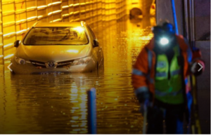 Lisbon flood sweeps cars